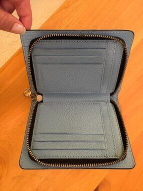 light blue leather Lodis zip wallet 4"x6"